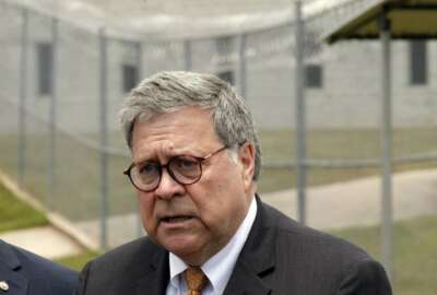 Attorney General William Barr speaks to reporters after a tour of a federal prison Monday, July 8, 2019, in Edgefield, S.C. (AP Photo/John Bazemore)