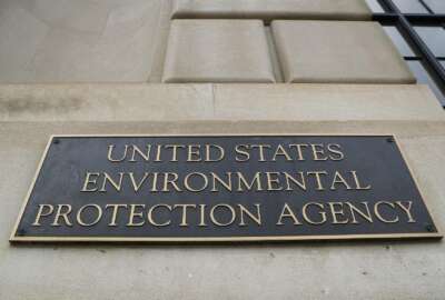 FILE - In this Sept. 21, 2017, file photo, the Environmental Protection Agency (EPA) Building is shown in Washington.  The Trump administration skirted some usual procedures and ethics rules when it remade the Environmental Protection Agency’s advisory panels to include fewer scientists. That’s the finding Monday of the Government Accountability Office, which reviewed the changes at the request of Democratic senators.  (AP Photo/Pablo Martinez Monsivais)