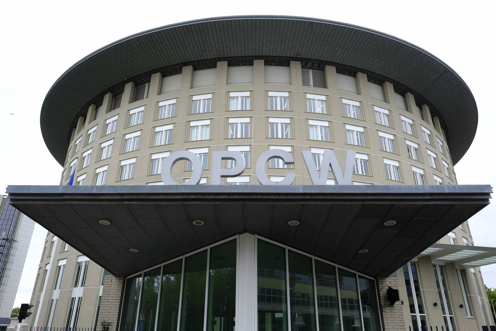 FILE - In this file photo taken on Friday, May 5, 2017, a view of the headquarters of the Organisation for the Prohibition of Chemical Weapons (OPCW), The Hague, Netherlands. Member states of the global chemical weapons watchdog are voicing concern that Syria may still possess such weapons after inspectors discovered traces of what could be a byproduct of a nerve agent or poison gas. In a report tabled Tuesday, July 9, 2019 at the Organization for the Prohibition of Chemical Weapons’ Executive Council, the organization’s director-general says the traces were found late last year at Syria’s Scientific Studies and Research Centre in Barza. (AP Photo/Peter Dejong, File)