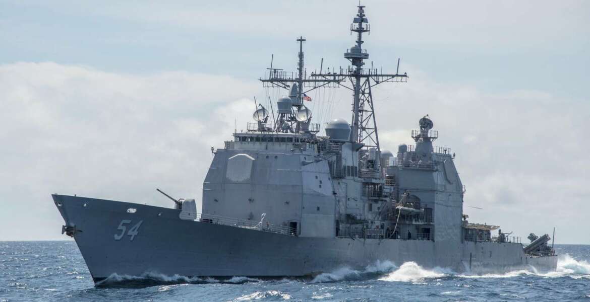 FILE - This March 6, 2016, photo provided by the U.S. Navy, shows the Ticonderoga-class guided-missile cruiser USS Antietam (CG 54) sails in the South China Sea. Taiwan says the U.S. Navy is free to sail through its strait after an American warship did so shortly following warnings from Beijing against foreign interference in its relationship with the island. Commander Clay Doss, a spokesman for the U.S. Navy's Seventh Fleet, said the 