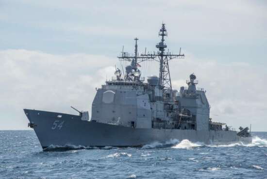 FILE - This March 6, 2016, photo provided by the U.S. Navy, shows the Ticonderoga-class guided-missile cruiser USS Antietam (CG 54) sails in the South China Sea. Taiwan says the U.S. Navy is free to sail through its strait after an American warship did so shortly following warnings from Beijing against foreign interference in its relationship with the island. Commander Clay Doss, a spokesman for the U.S. Navy's Seventh Fleet, said the 