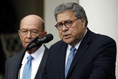 Attorney General William Barr speaks about the census as Commerce Secretary Wilbur Ross listens during an event with President Donald Trump in the Rose Garden at the White House, Thursday, July 11, 2019, in Washington. (AP Photo/Alex Brandon)