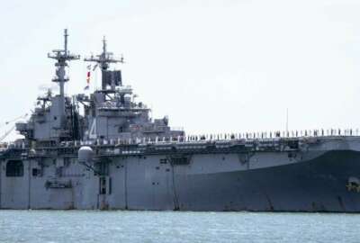 In this May 1, 2019, photo provided by the U.S. Navy, the amphibious assault ship USS Boxer (LHD 4) transits the San Diego Bay in San Diego, Calif. President Donald Trump says the USS Boxer destroyed an Iranian drone in the Strait of Hormuz amid heightened tensions between the two countries. Trump says it's the latest 