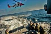 190808-N-NT795-137 rSAN DIEGO (Aug. 8, 2019) Sailors assigned to Coastal Riverine Squadron (CRS) 3 and Coast Guardsmen from U.S. Coast Guard Sector San Diego, conduct joint medical evacuation exercises aboard a Mark VI patrol boat as part of unit level training provided by Coastal Riverine Group (CRG) 1 Training and Evaluation Unit. The Coastal Riverine Force is a core Navy capability that provides port and harbor security, high value asset security, and maritime security in the coastal and inland waterways. (U.S. Navy photo by Chief Boatswains Mate Nelson Doromal Jr./Released)