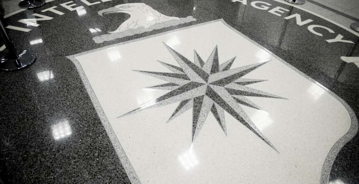 FILE- This Jan. 21, 2017, file photo shows the floor of the main lobby of the Central Intelligence Agency in Langley, Va. The FBI “exercised remarkable caution and candor” in securing search warrants that led to espionage charges against a former CIA employee, prosecutors have told a federal judge presiding over the case. Prosecutors said a court hearing is not necessary to reject Joshua Adam Schulte’s claims that evidence should be tossed out because searches of his New York City residence and various electronic accounts were illegal. (AP Photo/Andrew Harnik, File)