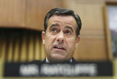 FILE - In this Wednesday, July 24, 2019, file photo, Rep. John Ratcliffe, R-Texas., questions former special counsel Robert Mueller as he testifies before the House Intelligence Committee hearing on his report on Russian election interference, on Capitol Hill in Washington. President Donald Trump says John Ratcliffe, his pick for national intelligence director, to stay in Congress, cites unfair media coverage. (AP Photo/Andrew Harnik, File)