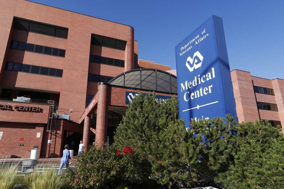 FILE - In this Oct. 4, 2017 file photo, the exterior of the Veterans Affairs Department hospital is shown in east Denver. Investigators with the VA Office of Inspector General found that the hospital violated policy by keeping improper wait lists to track veterans' mental health care, confirming a whistleblower’s claims. (AP Photo/David Zalubowski, File)