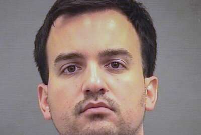 This image provided by the Alexandria Sheriff's Office shows Henry Kyle Frese. Frese, a Defense Intelligence Agency official was arrested Wednesday, Oct. 9, 2019, and charged with leaking classified intelligence information to two journalists, including a reporter he was dating, the Justice Department said. Frese was arrested by the FBI when he arrived at work at a DIA facility in Virginia. (Alexandria Sheriff's Office via AP)