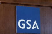 General Services Administration (GSA) logo on podium