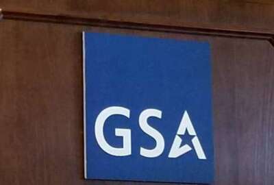 General Services Administration (GSA) logo on podium