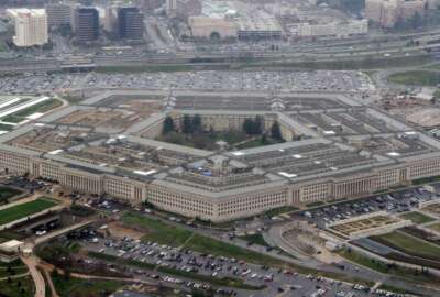 FILE - In this March 27, 2008 file photo, an aerial view of the Pentagon is seen in Washington. Amazon must decide soon if it will protest the Pentagon’s awarding of a $10 billion cloud computing contract to rival Microsoft on Oct. 25, 2019, with one possible grievance being the unusual attention given to the project by President Donald Trump. (AP Photo/Charles Dharapak, File)