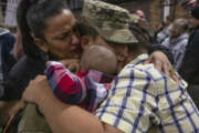 U.S. Army Soldiers with the 1st Squadron, 102nd Cavalry, New Jersey Army National Guard, are reunited with their families and friends after the welcome home ceremony at the National Guard Armory in Westfield, N.J., Dec. 12, 2019. The Soldiers, who are part of New Jerseys 44th Infantry Brigade Combat Team, served in support of Operation Spartan Shield in Jordan. (New Jersey National Guard photo by Mark C. Olsen)