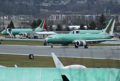 A Boeing 737 Max airplane being built for Norwegian Air International taxis for a test flight, Wednesday, Dec. 11, 2019, at Renton Municipal Airport in Renton, Wash. The chairman of the House Transportation Committee said Wednesday that an FAA analysis of the 737 Max performed after a fatal crash in 2018 predicted 