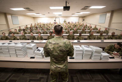 U.S. Air Force basic military training trainees are issued

personal computers during in-processing as part of a pilot test under a

Cooperative Research and Development Agreement partnership at Joint Base San

Antonio-Lackland, Texas, Dec. 11, 2019. The computers replace all hard copy

textbooks BMT trainees currently use with the intent to help BMT assess

learning outcomes, value and return on investment. (U.S. Air Force photo by Sarayuth Pinthong)