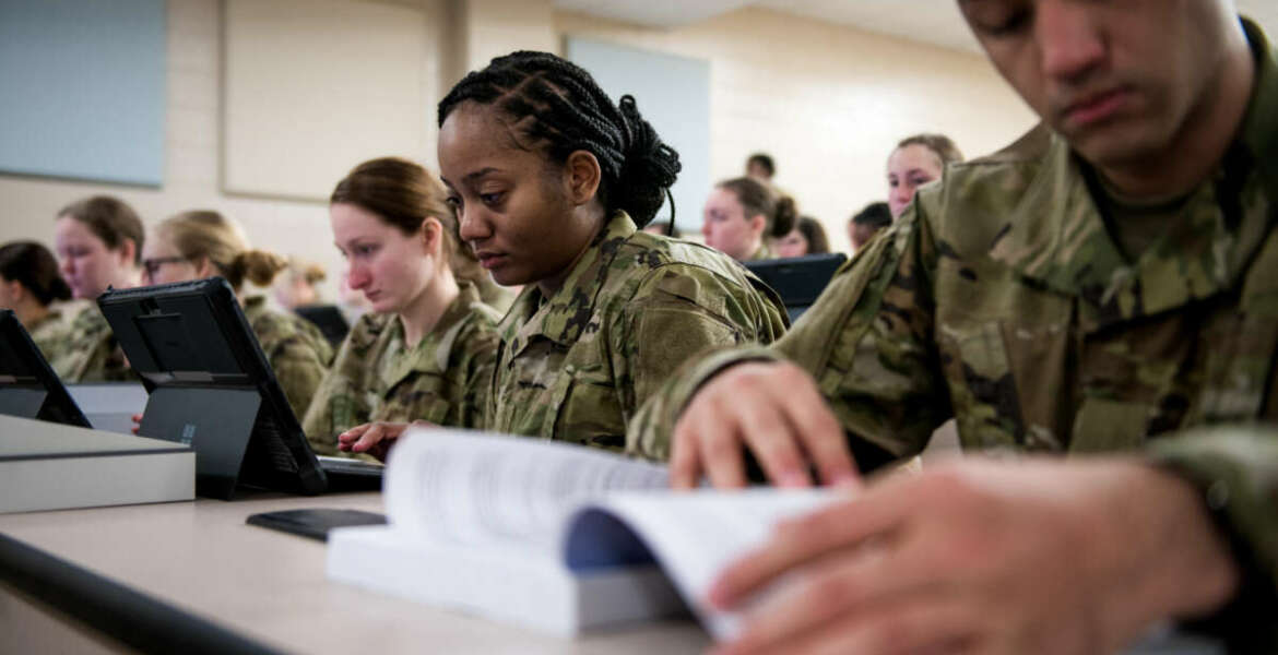 U.S. Air Force basic military training trainees are issued personal computers during in-processing as part of a pilot test under a Cooperative Research and Development Agreement partnership at Joint Base San Antonio-Lackland, Texas, Dec. 11, 2019. The computers replace all hard copy

textbooks BMT trainees currently use with the intent to help BMT assess learning outcomes, value and return on investment. (U.S. Air Force photo by Sarayuth Pinthong)
