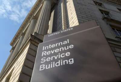 FILE - In this photo March 22, 2013 file photo, the exterior of the Internal Revenue Service (IRS) building in Washington. The IRS provided poor customer service during this year's tax filing season as taxpayers struggled with a rise in identity theft and complications related to President Barack Obamas health law, a government watchdog said Wednesday. A new report by the National Taxpayer Advocate says the IRS has been hampered by budget cuts. (AP Photo/Susan Walsh, File)