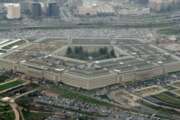 FILE - This March 27, 2008, aerial file photo, shows the Pentagon in Washington. A Federal court has ordered the Pentagon to temporarily halt work with Microsoft on its $10 billion military cloud contract, Thursday, Feb. 13, 2020, after Amazon sued alleging that President Donald Trump's bias against the company hurt its chances to win the project.  Amazon requested the court issue the injunction last month. Both the documents requesting the block and the judge's decision to issue the temporary injunction are sealed by the court.   (AP Photo/Charles Dharapak, File)