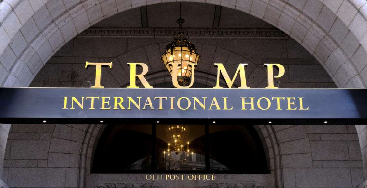 FILE- This March 11, 2019 file photo, shows the north entrance of the Trump International in Washington.  A federal appeals court in Washington on Friday dismissed a lawsuit filed by members of Congress that charged that President Donald Trump has illegally profited off the presidency.  (AP Photo/Mark Tenally, File)