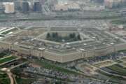 FILE - This March 27, 2008, aerial file photo, shows the Pentagon in Washington.  The Pentagon is reconsidering its awarding of a major cloud computing contract to Microsoft after rival tech giant Amazon protested what it called a flawed bidding process. U.S. government lawyers said in a court filing this week of March 13, 2020  that the Defense Department “wishes to reconsider its award decision” and take another look at how it evaluated technical aspects of the companies' proposals to run the $10 billion computing project. (AP Photo/Charles Dharapak, File)