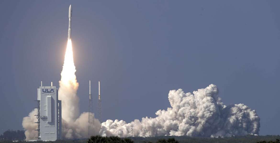 A United Launch Alliance Atlas V rocket lifts off from launch complex 41 at the Cape Canaveral Air Force Station with a payload of a high frequency satellite Thursday, March 26, 2020, in Cape Canaveral, Fla. Built by Lockheed Martin, this U.S. military spacecraft will provide highly-secure communications. (AP Photo/John Raoux)