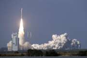 A United Launch Alliance Atlas V rocket lifts off from launch complex 41 at the Cape Canaveral Air Force Station with a payload of a high frequency satellite Thursday, March 26, 2020, in Cape Canaveral, Fla. Built by Lockheed Martin, this U.S. military spacecraft will provide highly-secure communications. (AP Photo/John Raoux)