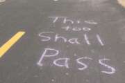 Chalked message on a bike trail in Roseville, Calif. on Saturday March 21, 2020. A little more than 24 hours after Gov. Gavin Newsom issued an unprecedented stay-at-home order to nearly 40 million residents to help curb the coronavirus spread, most Californians were faced with how to spend two days of free time with strict limits on their freedom. (AP Photo/Don Thompson)