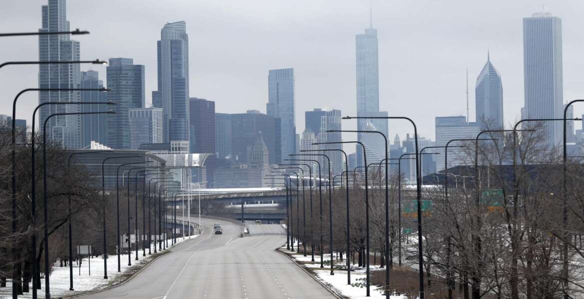 Chicago's Lake Shore Drive is barren of its usual vehicle traffic, Monday, March 23, 2020. The coronavirus pandemic could test a generation in ways they have never faced. One expert likens the impact to that of the Great Depression. As they're being asked to study at home and distance socially to help their more vulnerable elders, how will they cope? (AP Photo/Charles Rex Arbogast)