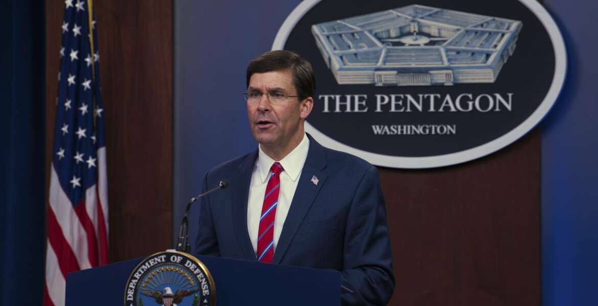 In this image provided by the Department of Defense, Defense Secretary Mark Esper speaks to members of the media during a news conference to discuss the department's efforts in response to the COVID-19 pandemic at the Pentagon Briefing Room in Washington, on Monday, March 23, 2020. (Army Staff Sgt. Nicole Mejia/Department of Defense via AP)