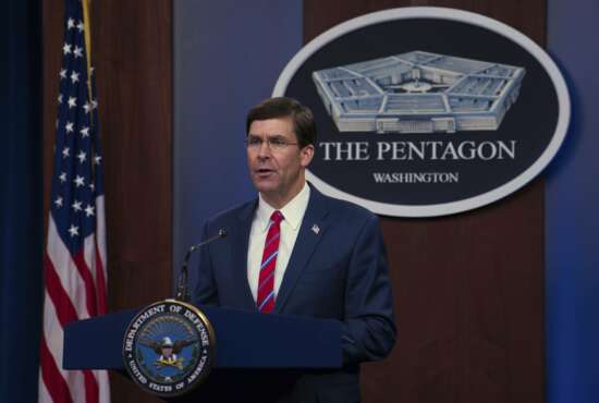 In this image provided by the Department of Defense, Defense Secretary Mark Esper speaks to members of the media during a news conference to discuss the department's efforts in response to the COVID-19 pandemic at the Pentagon Briefing Room in Washington, on Monday, March 23, 2020. (Army Staff Sgt. Nicole Mejia/Department of Defense via AP)