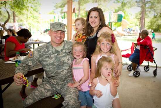 Chief Warrant Officer 3 Donald Culp spends time with his Family before a deployment. Culp was an active duty service member whose daughter, Braelyn, benefited from the Exceptional Family Member Program. EFMP is a mandatory program that helps Soldiers with special needs children obtain any care or treatment they may need.  (Courtesy Photo)