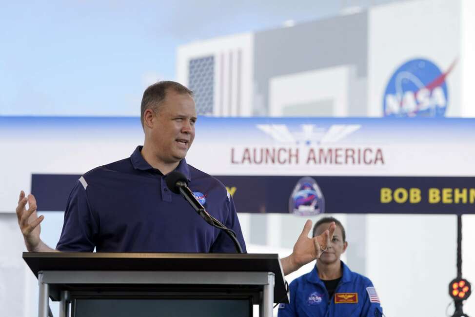 NASA Administrator Jim Bridenstine answers a question during a countdown clock briefing for the SpaceX Demo-2 mission Friday, May 29, 2020, at Kennedy Space Center in Cape Canaveral, Fla. The Falcon 9, with the Crew Dragon spacecraft on top of the rocket, is scheduled to liftoff from Launch Pad 39-A Saturday. Two astronauts will fly on the mission to the International Space Station. (AP Photo/David J. Phillip)