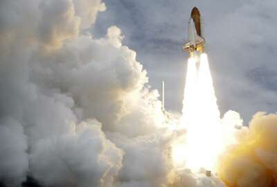 FILE - In this Friday, July 8, 2011 file photo, the space shuttle Atlantis lifts off from the Kennedy Space Center in Cape Canaveral, Fla. Atlantis was the 135th and last space shuttle launch for NASA. (AP Photo/John Raoux)