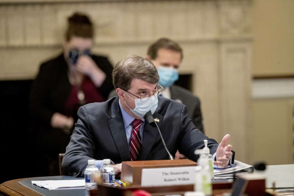 Veterans Affairs Secretary Robert Wilkie speaks during a House Appropriations Subcommittee on Military Construction, Veterans Affairs, and Related Agencies hearing on Capitol Hill in Washington, Thursday, May 28, 2020, on the Department of Veterans Affairs response to COVID-19. (AP Photo/Andrew Harnik, Pool)