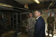 Bill Marion, Secretary of the Air Force deputy chief information officer, listens to a Tyndall Airman Dec. 18, 2018, about the work the 325th Communication Squadron’s Airmen did to safeguard important equipment instrumental to the Radio Frequency transmissions infrastructure on Tyndall Air Force Base, Fla., in timeframes before and immediately after Hurricane Michael made landfall. Hurricane Michael was a Category 4 hurricane that made landfall Oct. 10, 2018, that caused near catastrophic damage to the Panama City area. (U.S. Air Force photo by Airman 1st Class Solomon Cook)