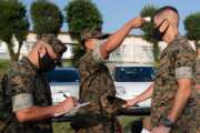 Ready at a moment's notice. Marines from the 3rd Marine Expeditionary Brigade conducted a rapid deployment drill at Kadena Air Base, Japan, Aug. 18. The drill is designed to ensure Alert Contingency Marine Air Ground Task Force personnel are able to respond to a crisis swiftly, even in the midst of the COVID pandemic. 