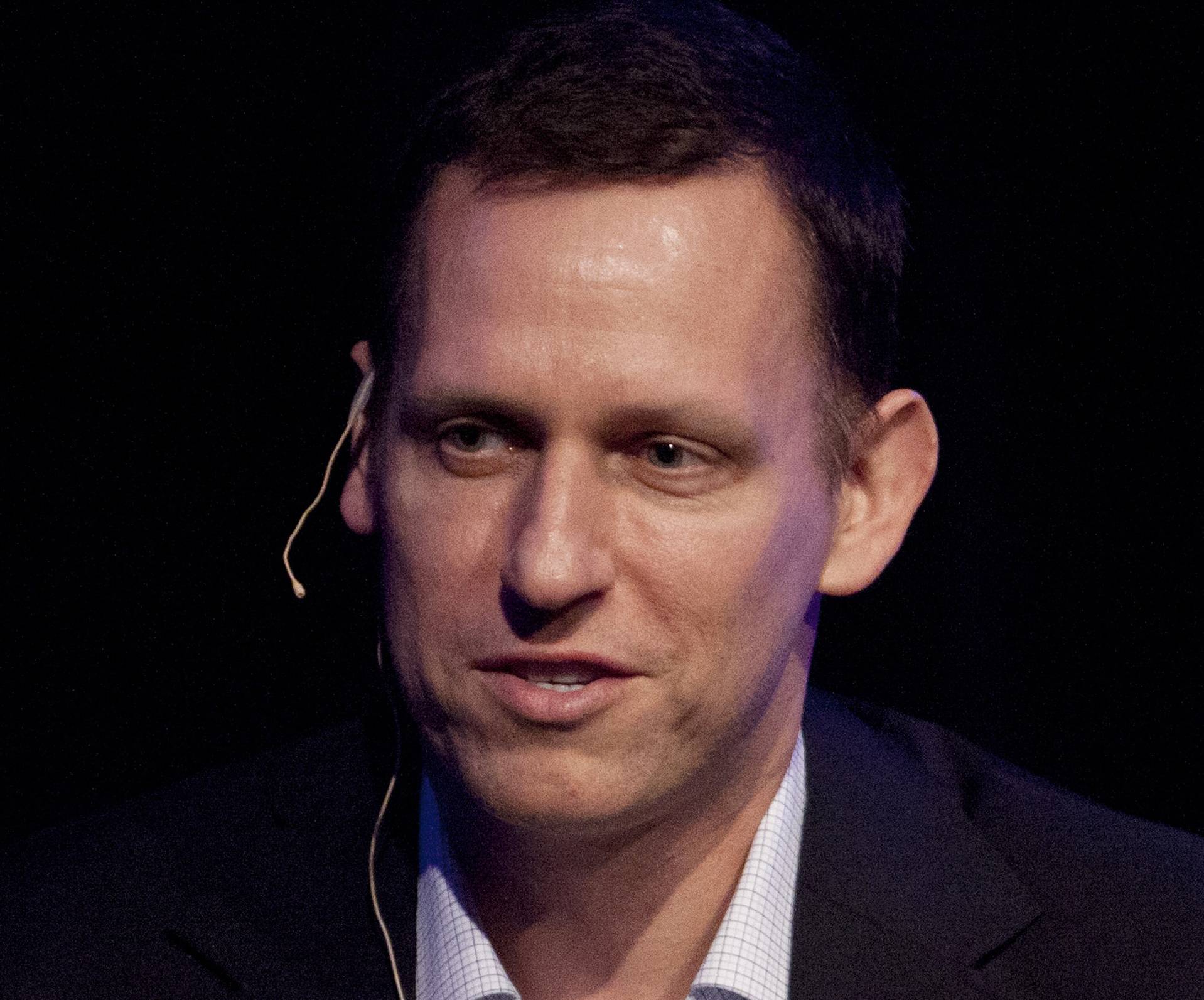 FILE - In this Thursday, March 8, 2012, file photo, Clarium Capital President Peter Thiel speaks during his keynote speech at the StartOut LGBT Entrepreneurship Awards in San Francisco. Seventeen years after it was born with the help of CIA seed money, Palantir Technologies is finally going public. Thiel, the iconoclastic entrepreneur and PayPal co-founder, holds the largest chunk of Palantir stock. (AP Photo/Ben Margot, File)