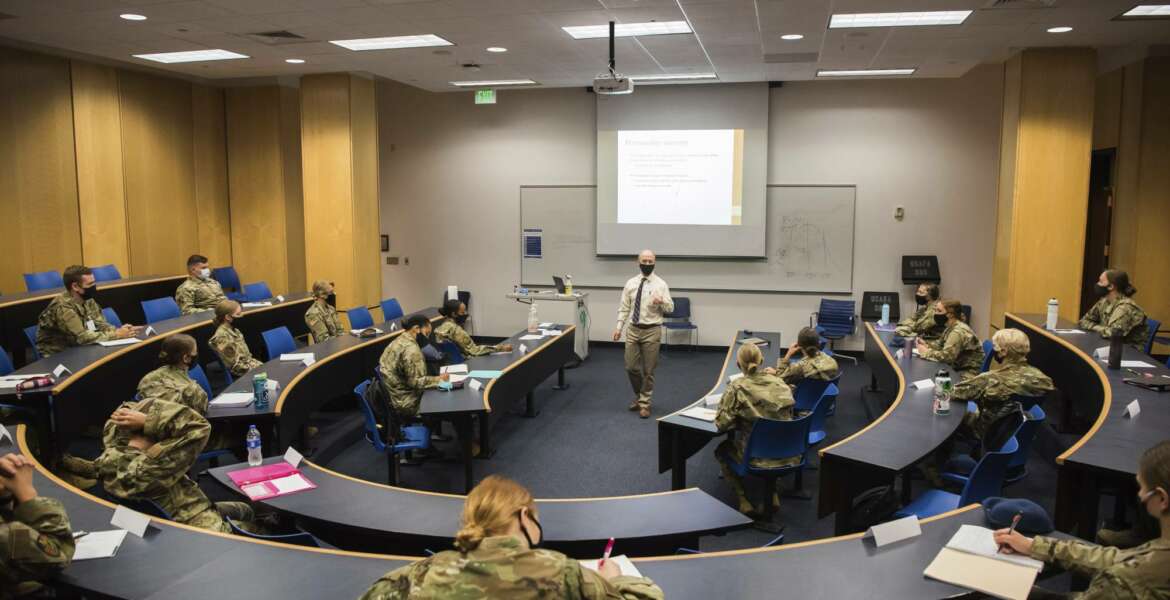 In this image provided by the U.S. Air force Academy, academy cadets start the school year with a mix of reduced class sizes and remote learning on Aug. 12, 2020, at the U.S. Air Force Academy in Colorado Springs, Colo. Under the siege of the coronavirus pandemic, classes have begun at the Naval Academy, the Air Force Academy and the U.S. Military Academy at West Point. But unlike at many colleges around the country, most students are on campus and many will attend classes in person. (Trevor Cokley/U.S. Air Force Academy via AP)