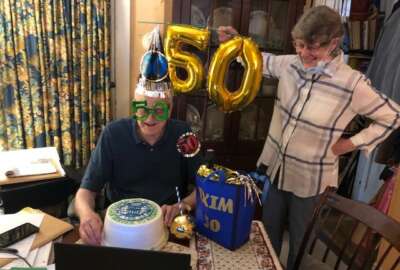  Jim Cruse and his wife, Cookie, during a virtual celebration of his 50th Anniversary at EXIM
