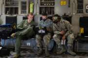 Maj. Philip Becker, 8th Airlift Squadron pilot, left, works with 62nd Aircraft Maintenance Squadron Airmen to complete preflight checks at Joint Base Lewis-McChord, Wash., Aug. 6, 2020. The flight was part of Exercise Long Hammer/Rainier War, a week-long exercise designed to evaluate Team McChord’s ability to conduct airlift operations while complying with real-world COVID-19 pandemic countermeasures. (U.S. Air Force photo by Senior Airman Sara Hoerichs)