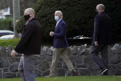 President-elect Joe Biden leaves St. Ann Parish, Saturday, Nov. 21, 2020, in Wilmington, Del. (AP Photo/Alex Brandon)