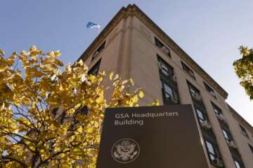 The General Services Administration (GSA) building is seen, Tuesday, Nov. 10, 2020, in Washington. General Service Administrator Emily Murphy, the head of the obscure federal government agency that is holding up Joe Biden's presidential transition, appeared to know she might be facing a messy situation after the votes came in. Prior to Nov. 3, Emily Murphy, the head of the General Services Administration, held a Zoom call with Dave Barram, 77, a man who was in her shoes 20 years earlier during the contested 2000 election between George W. Bush and Al Gore. Barram said he advised her to "do the right thing, then all you have to do is live with the consequences of it.’”  (AP Photo/Jacquelyn Martin)