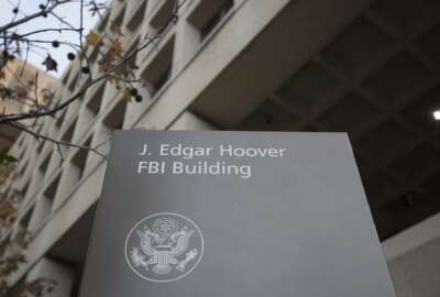 FILE - In this Nov. 30, 2017, file photo, the J. Edgar Hoover FBI building in Washington Lawyers for a former FBI lawyer who pleaded guilty to altering an email during the Trump-Russia investigation 