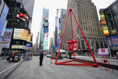 In celebration of Giving Tuesday a giant Salvation Army Red Kettle is seen Tuesday, Dec. 1, 2020, in New York's Times Square. The kettle is in place in various New York City locations during the holiday season. (AP Photo/Mary Altaffer)