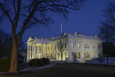 Dusk settles over the White House in Washington, Saturday, Jan. 23, 2021. (AP Photo/Patrick Semansky)