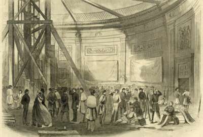This illustration in the May 25, 1861 issue of Harper's Weekly depicts the Eighth Massachusetts Regiment with some civilians, and mattresses on the floor in the rotunda of the Capitol in Washington. To most Americans, the sight of armed National Guard troops sleeping in the Capitol Rotunda this past week was shocking and disturbing. But it also was an echo of the far-distant past — the Capitol was used as a bivouac for troops during the Civil War. (Harper's Weekly/Wilson's Creek National Battlefield via AP)