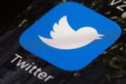 FILE - This April 26, 2017, file photo shows the Twitter app icon on a mobile phone in Philadelphia. Twitter is enlisting its users to help combat misinformation on its service by flagging and notating misleading and false tweets. The pilot program unveiled Monday, Jan. 25, 2021 called Birdwatch, allows a preselected group of users — for now, only in the U.S. — who sign up through Twitter. Those who want to sign up must have a U.S.-based phone carrier, verified email and phone number, and no recent Twitter rule violations. (AP Photo/Matt Rourke, File)