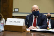 United States Postal Service Postmaster General Louis DeJoy speaks during a House Oversight and Reform Committee hearing on "Legislative Proposals to Put the Postal Service on Sustainable Financial Footing" on Capitol Hill, Wednesday, Feb. 24, 2021, in Washington. (Graeme Jennings/Pool via AP)