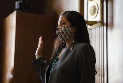 Rep. Deb Haaland, D-N.M., is sworn in during a Senate Committee on Energy and Natural Resources hearing on her nomination to be Interior Secretary, Tuesday, Feb. 23, 2021 on Capitol Hill in Washington. (Graeme Jennings/Pool via AP)