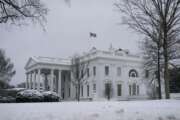 Snow covers the ground at the White House, Monday, Feb. 1, 2021, in Washington. (AP Photo/Evan Vucci)