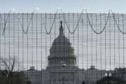 Fencing and razor wire surrounds the perimeter of the Capitol in Washington, Thursday, Feb. 25, 2021. (AP Photo/J. Scott Applewhite)